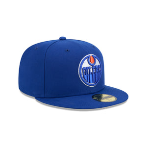 NEW ERA Edmonton Oilers 59FIFTY NHL Cap in Blau, seitliche Ansicht with team logo