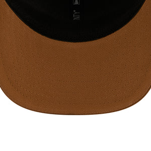 Neue Era Baltimore Ravens 9SEVENTY Trucker Cap in Beige mit Stretch-Snap-Verschluss, NFL-Logo auf der Vorderseite