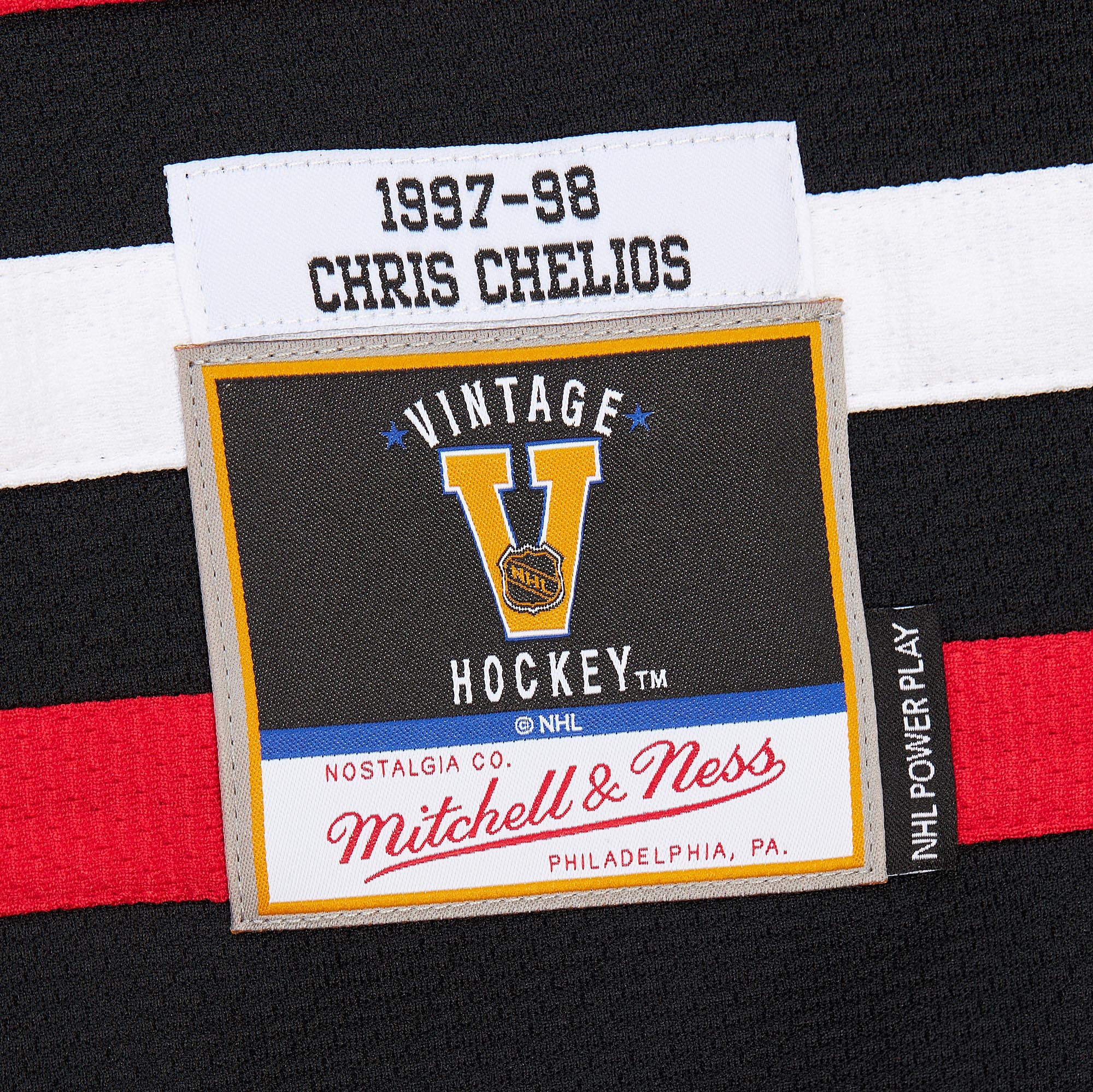 Chris Chelios #7 Chicago Blackhawks Mitchell & Ness 1997 Premium PowerPlay NHL Trikot Schwarz