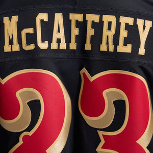 Nike Christian McCaffrey #23 San Francisco 49ers Trikot in Schwarz, mit gesticktem NFL-Logo und Team-Details.