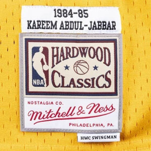 Kareem Abdul Jabbar Los Angeles Lakers Mitchell & Ness NBA Swingman Trikot 1984-1985 Gelb - STADIUMDREAMS